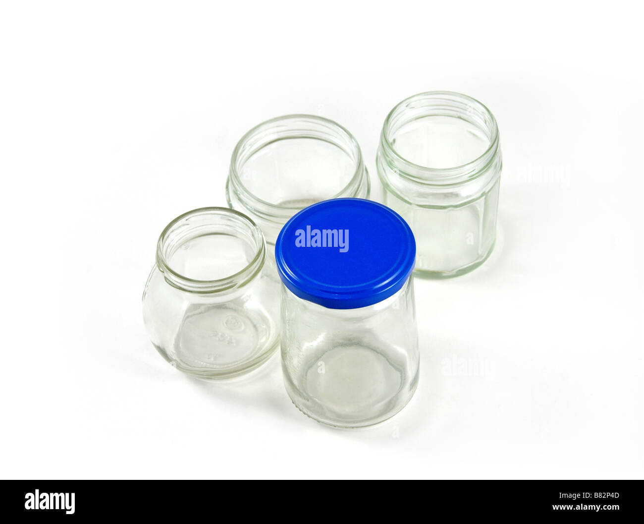 Four empty glass jam jars Stock Photo Alamy
