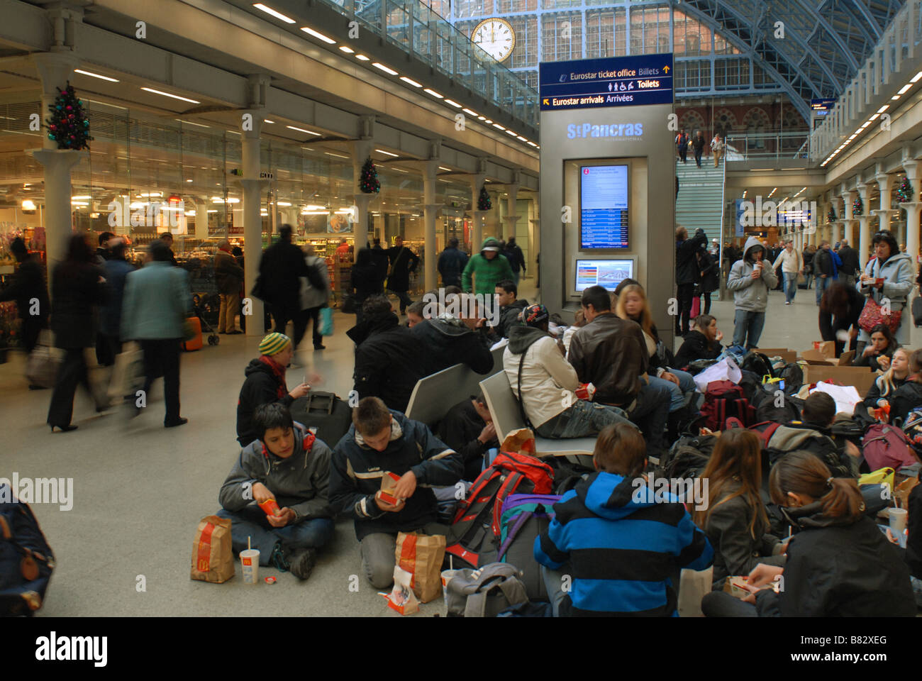 Young passengers waiting for their Eurostar train at St Pancras Station, London Stock Photo