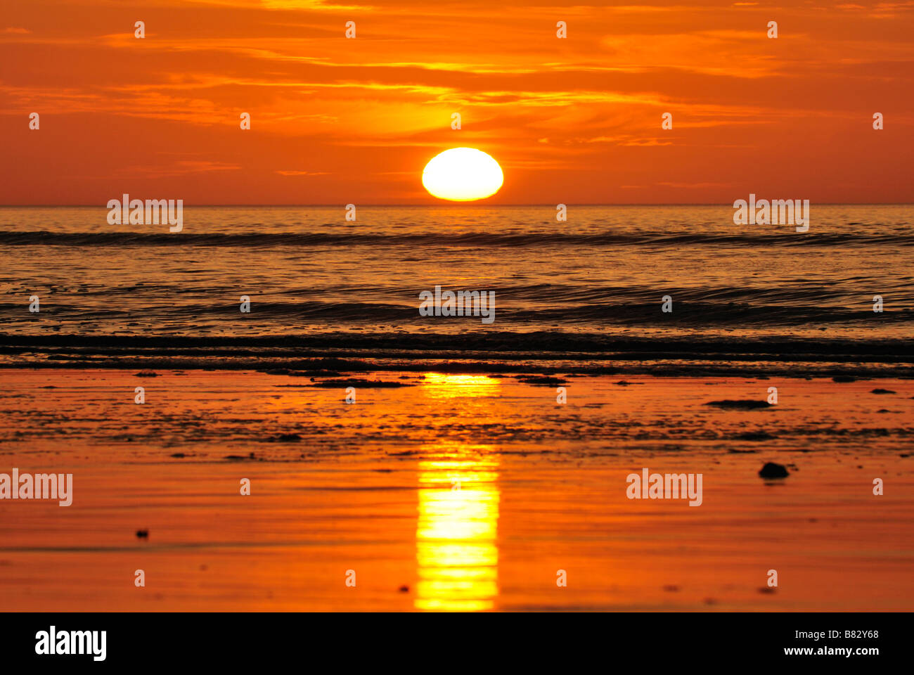 sunset over ocean Stock Photo