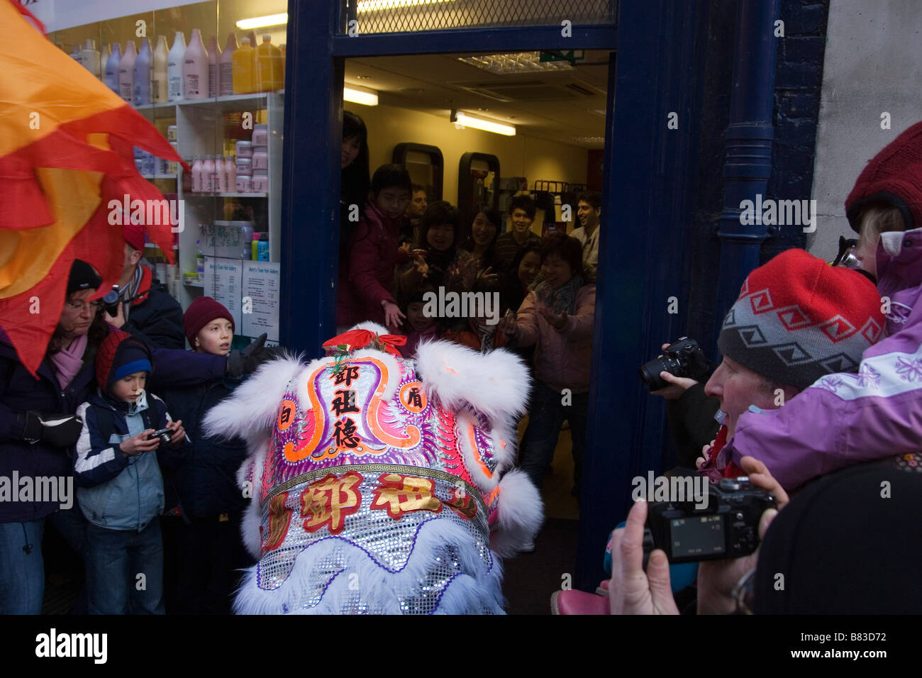 Chinese Lion in London s China Town celebrating Chinese new year Stock Photo
