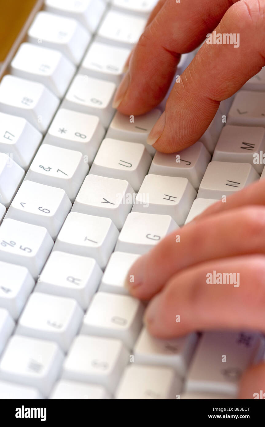 Close up of fingers typing on keys computer keyboard Stock Photo Alamy