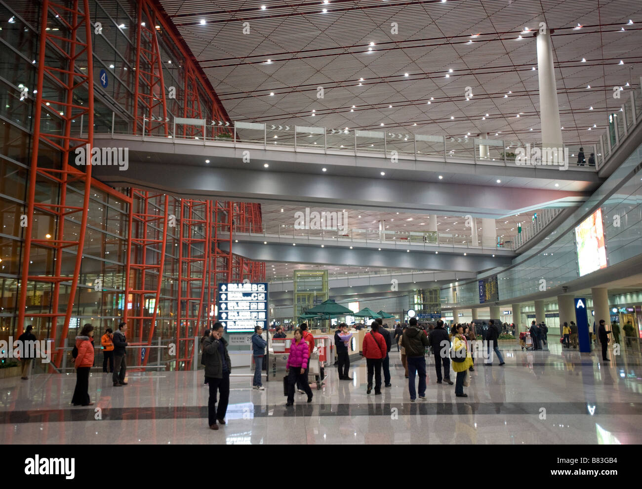 Interior wide view of new modern architecture and design of Beijing Airport Terminal 3 2009 Stock Photo
