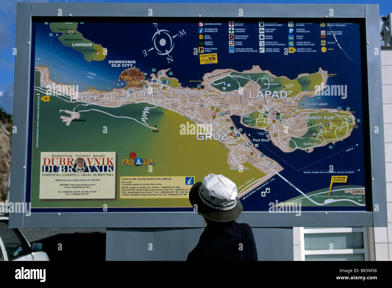 traveller looking at a city  layout, Stock Photo