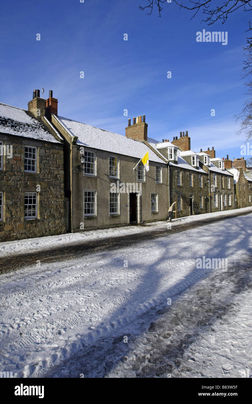 The houses in the High Street at the University in Old Aberdeen, Scotland, UK, covered in snow during winter Stock Photo