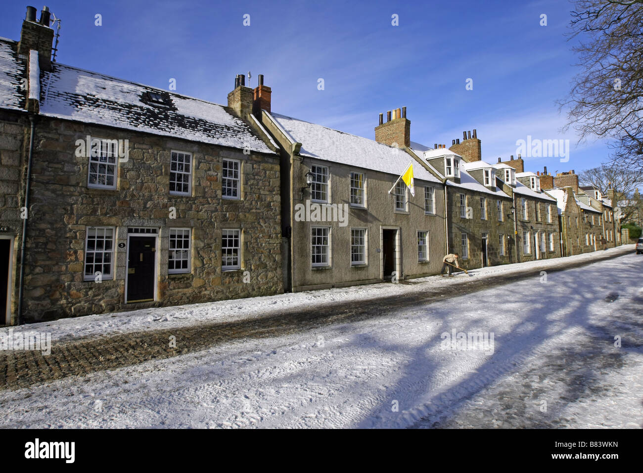 The houses in the High Street at the University in Old Aberdeen, Scotland, UK, covered in snow during winter Stock Photo