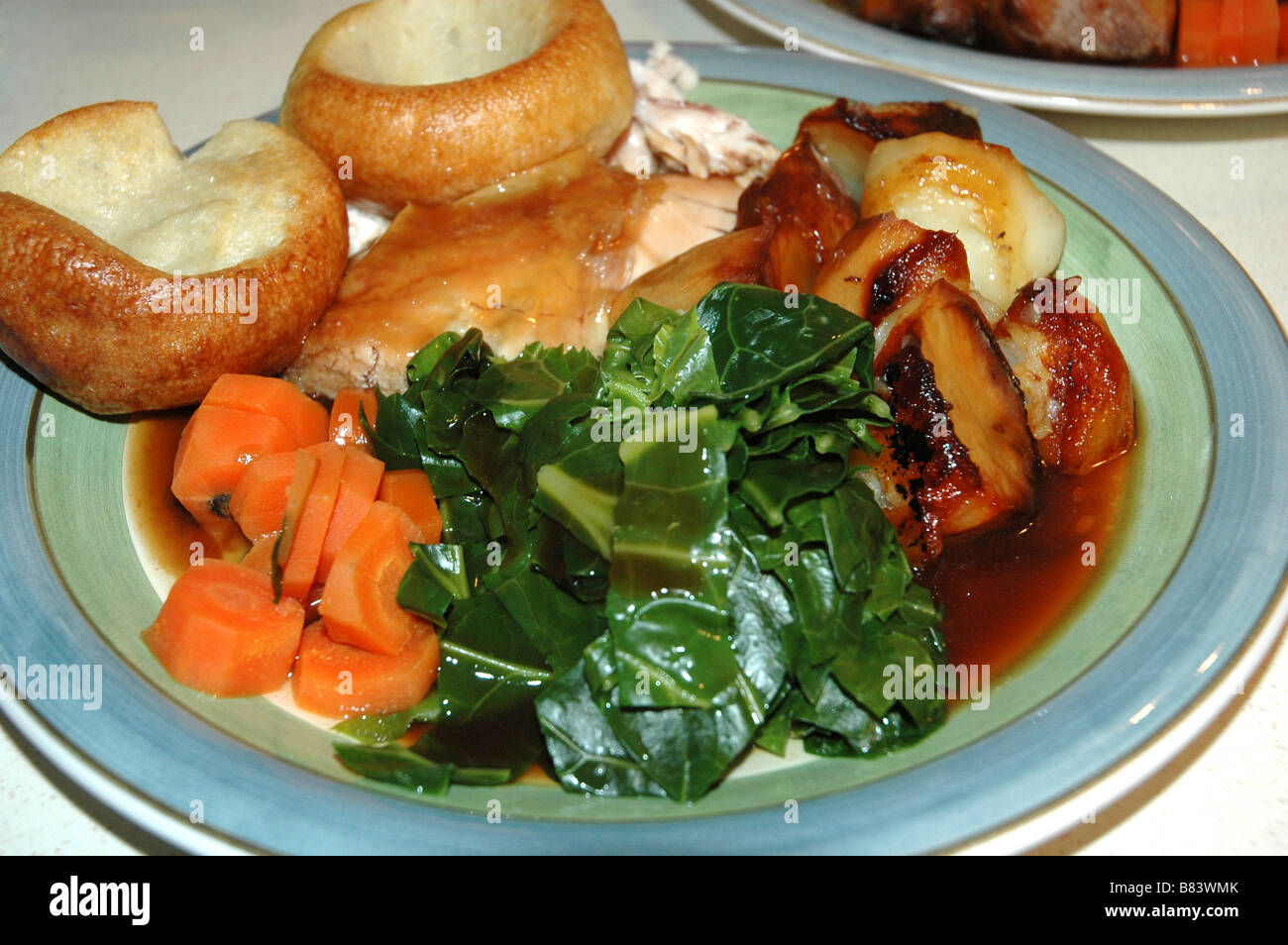 A roast dinner on a plate Stock Photo Alamy