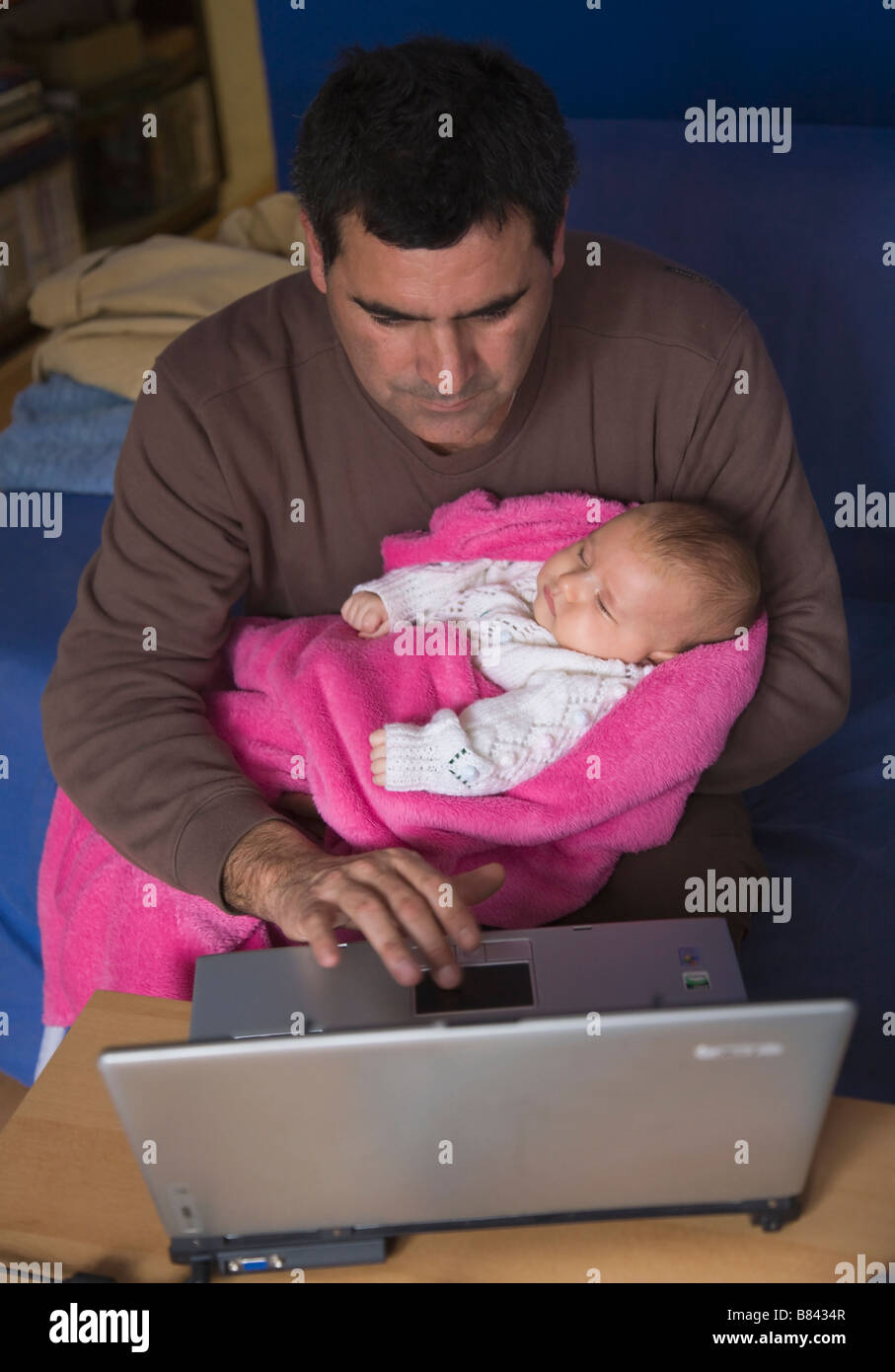 Father using computer hi-res stock photography and images - Alamy