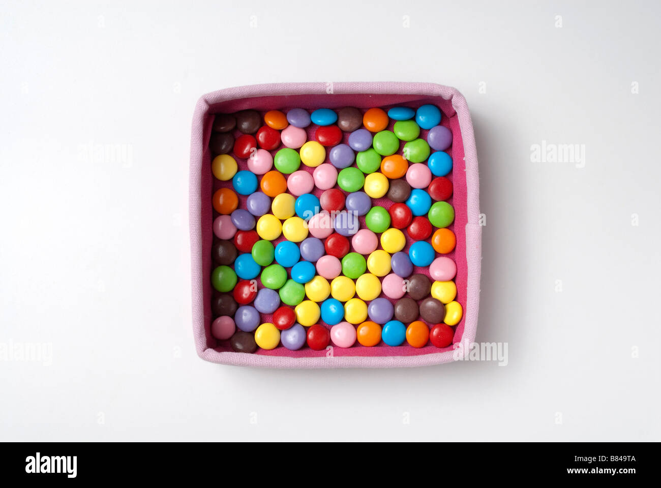 Smarties sweets in Pink box Stock Photo