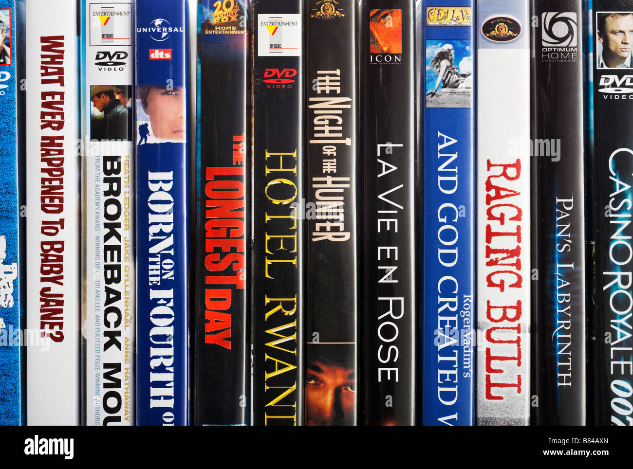 Row of spines of famous DVD films close up Stock Photo