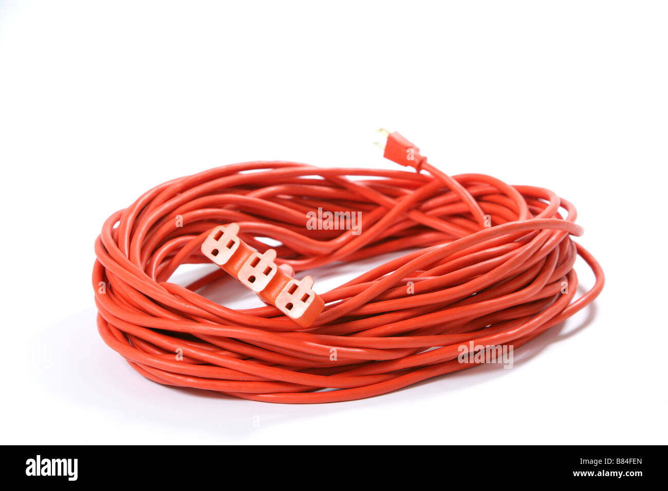 A 100 foot orange extension cord coiled up with a three way splitter