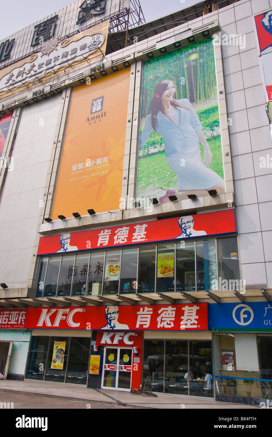 ZHUHAI GUANGDONG PROVINCE CHINA Kentucky Fried Chicken fast food restaurant exterior with billboards above Stock Photo