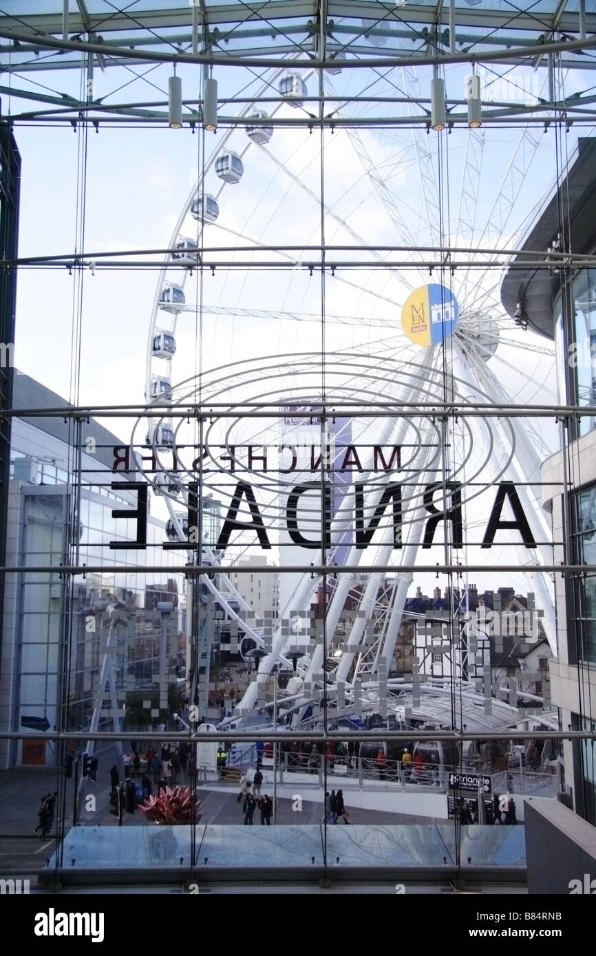 The Big Wheel at Manchester seen through the windows at the Arndale centre Stock Photo