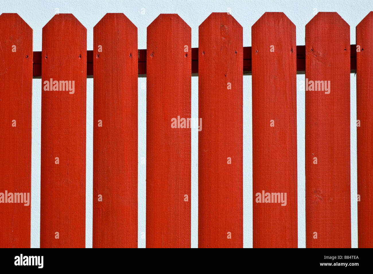 Red fence against blue background in Grand Bahama Stock Photo - Alamy