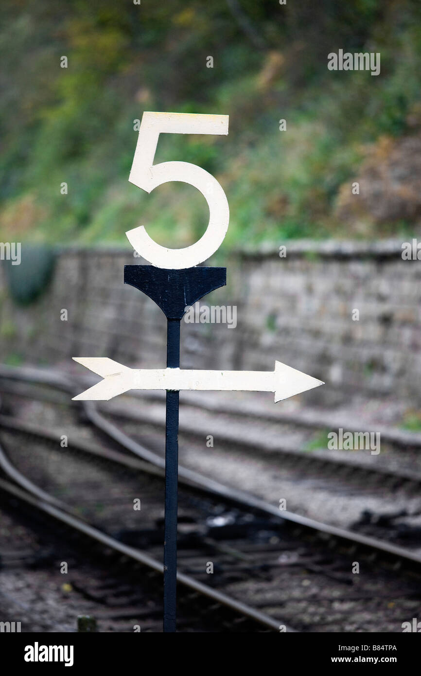 Directions at a railroad crossing Stock Photo Alamy