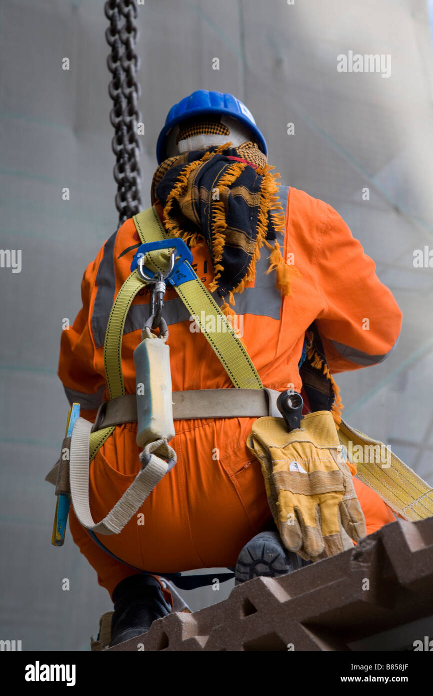 construction worker wearing protective clothing hard hat Stock Photo