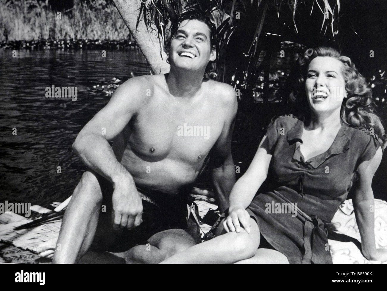 Tarzan and the huntress Year : 1947 USA Director : Kurt Neumann Johnny Weissmuller, Brenda Joyce Stock Photo