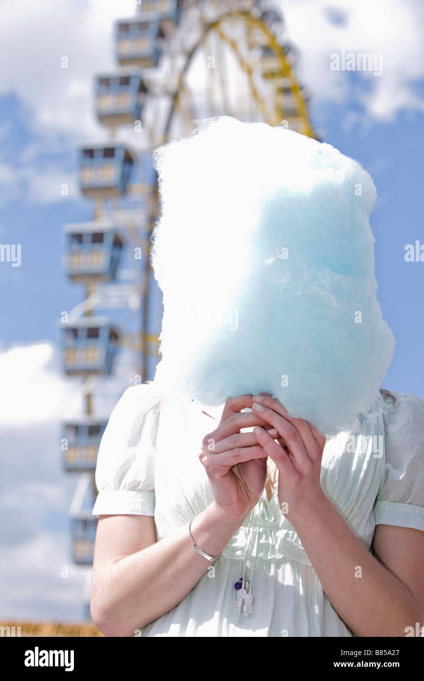 Girl hiding candy hi-res stock photography and images - Alamy