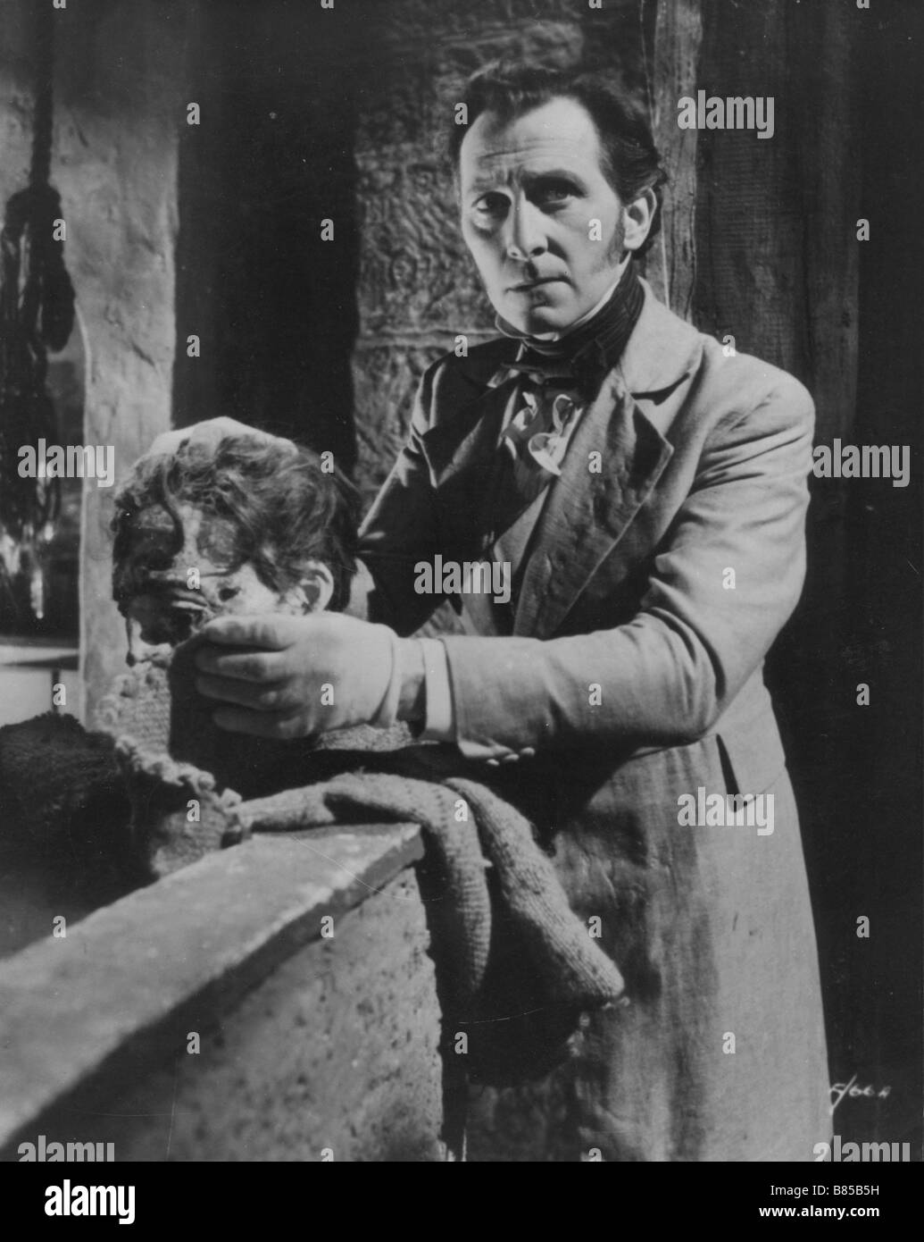 The Curse of Frankenstein  Year : 1957 - UK Peter Cushing  Director : Terence Fisher Stock Photo