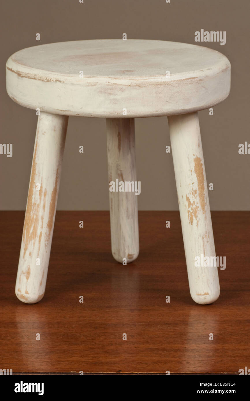 Three legged stool Stock Photo