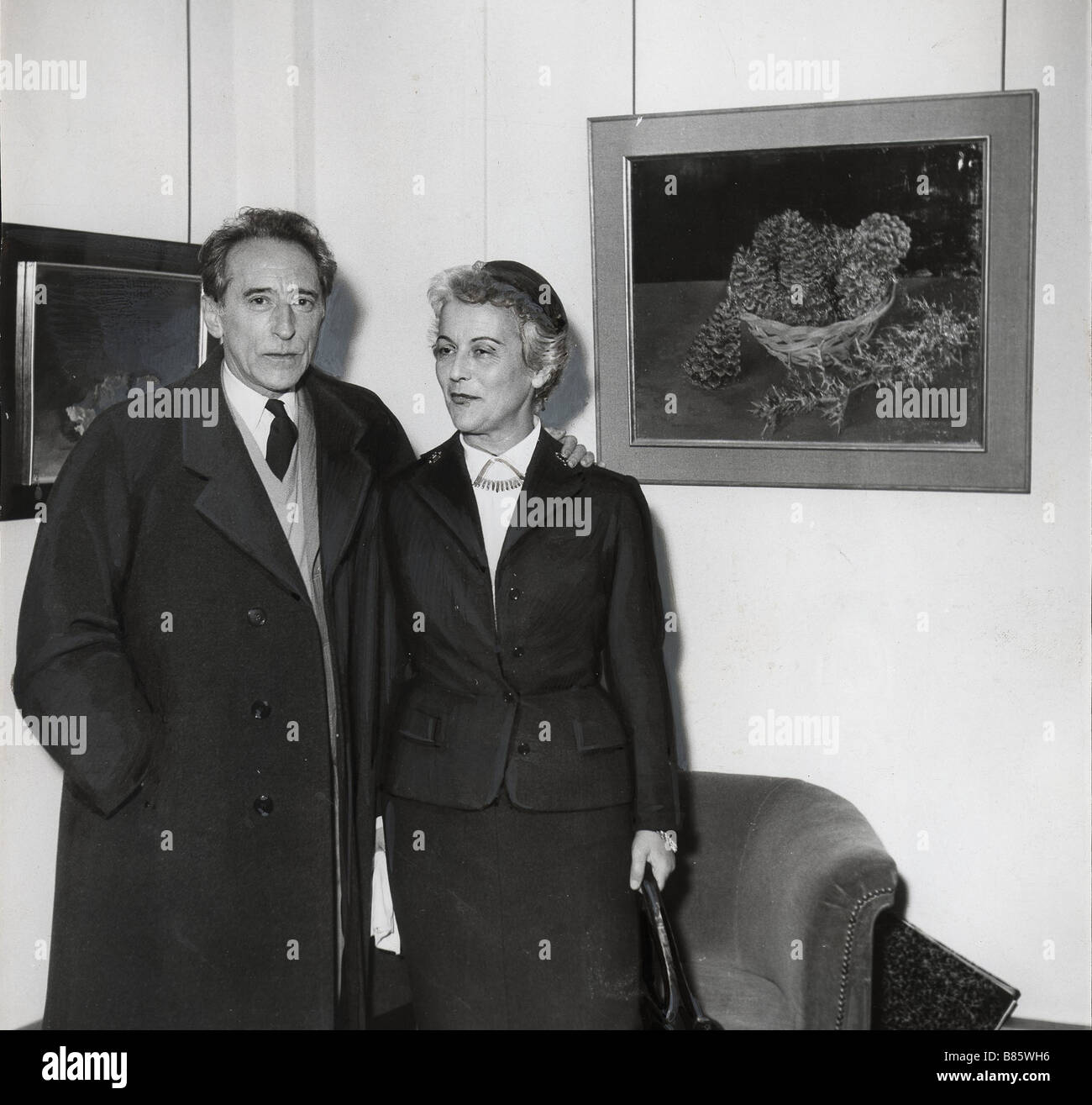 Cocteau congratulating Nora Auric, 1953 Stock Photo