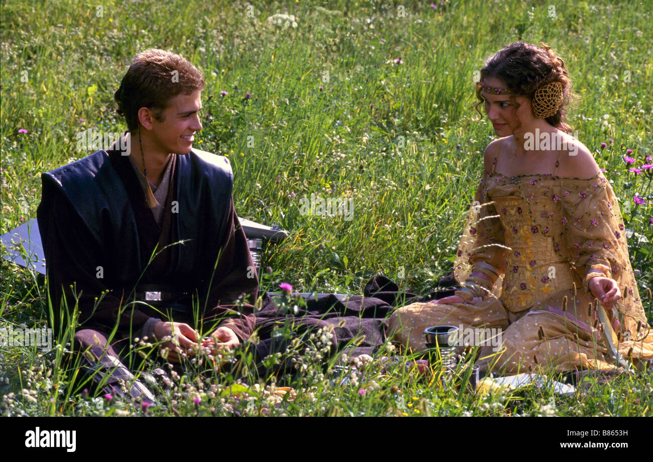 Star Wars II, attack of the clones  Year : 2002 USA Hayden Christensen as Anakin Skywalker and Natalie Portman as Padmé Amidala share a blissful moment at the Lake country of Naboo  Director : George Lucas Stock Photo