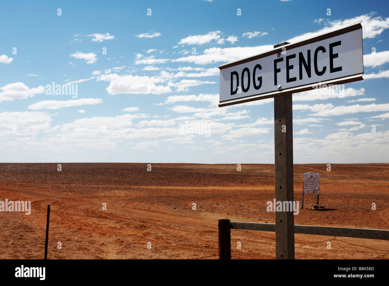 Sign Dog Fence Oodnadatta track South Australia near Coober Pedy Stock