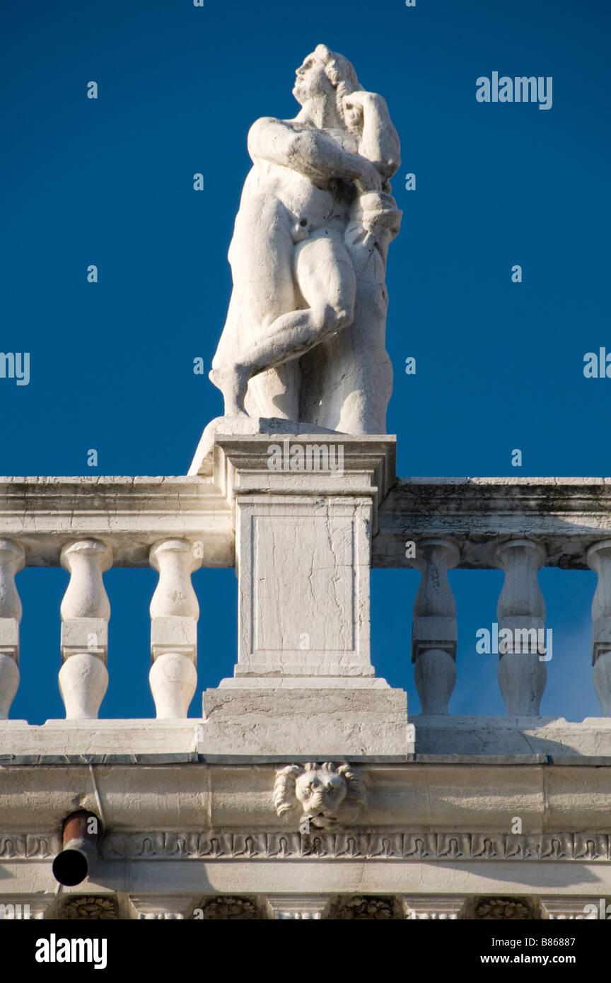 Statue on the National Library of St Mark's viewed from the piazzetta Venice, Itatly Stock Photo