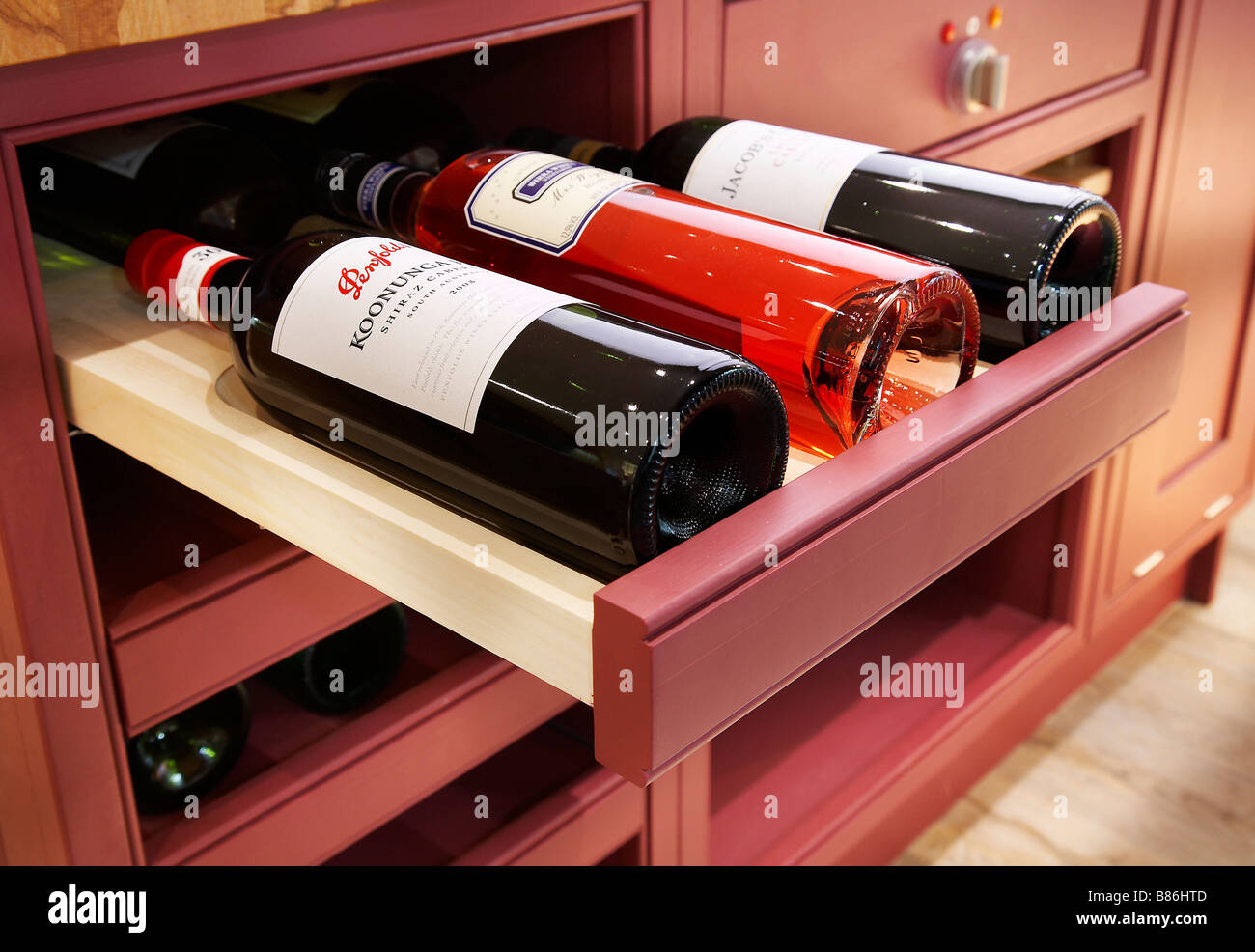 Wine compartment drawer in a kitchen unit. Stock Photo