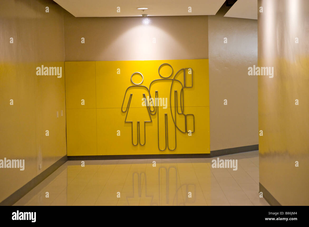Toilet and Phone sign inside a modern shopping mall Stock Photo