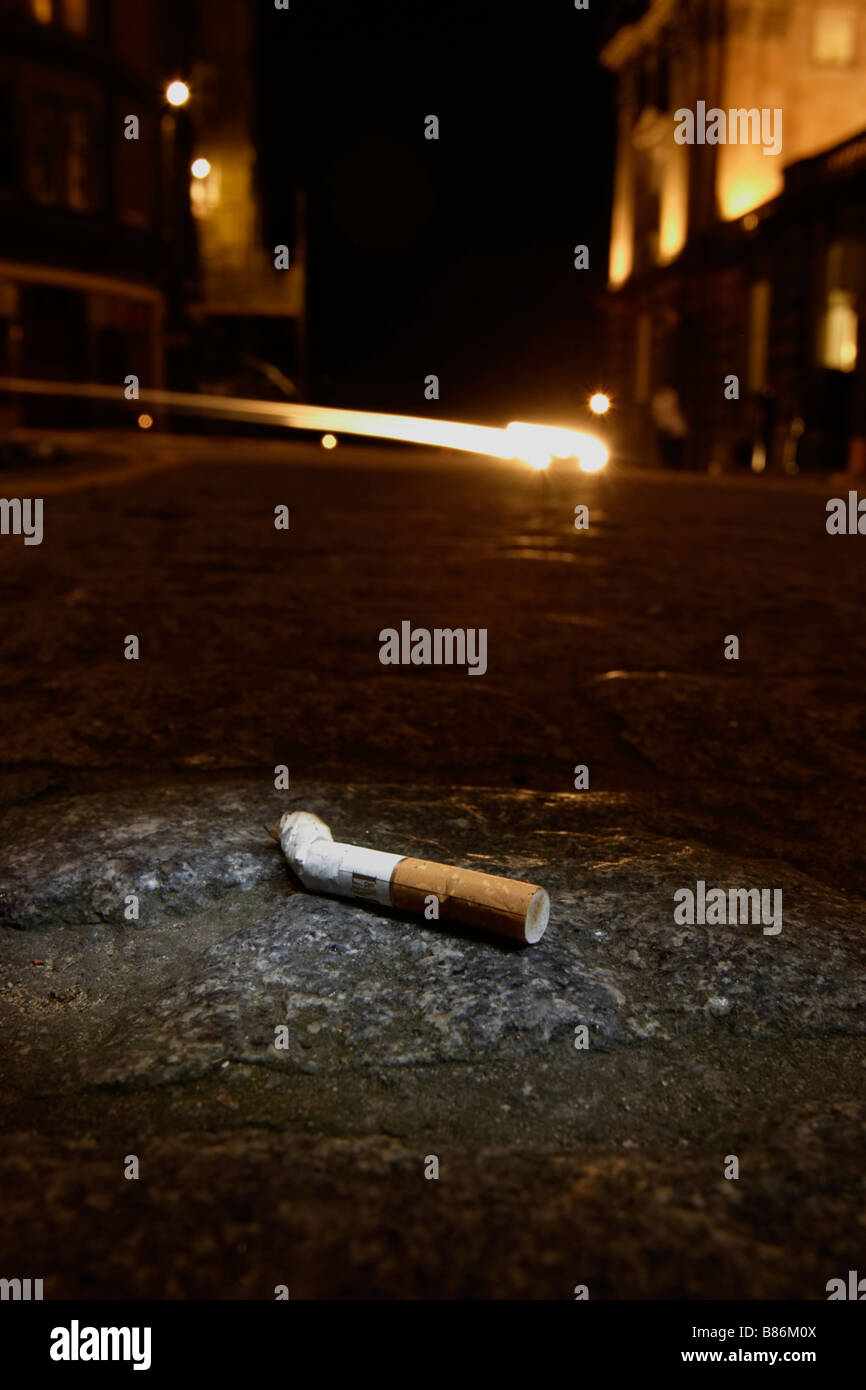cigarette at night Cigarette litter night on streets hi-res stock photography and images