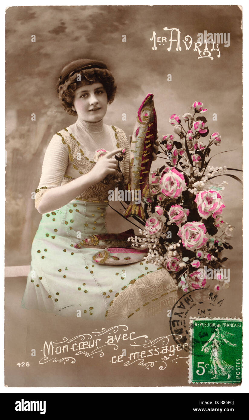 April Fool's Day / Poisson d'Avril - early 1900s traditional French picture  postcard depicting woman holding fish Stock Photo - Alamy