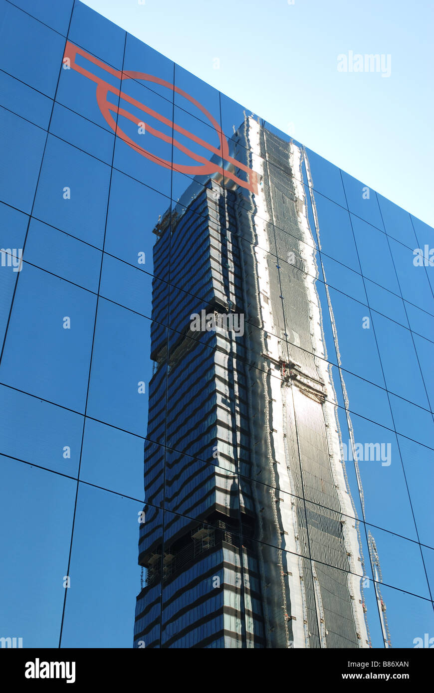 Repsol Tower reflected on glass facade. Madrid. Spain. Stock Photo