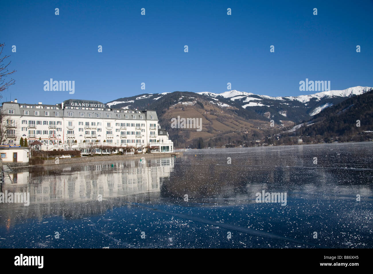Zell am See Austria EU January View across the frozen Zeller See lake towards the Thumersbach area on the opposite bank Stock Photo