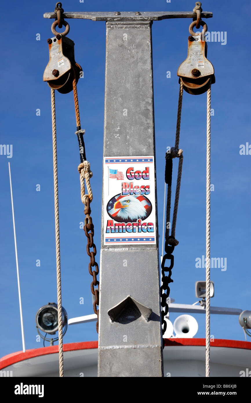 block and tackle hoisting system on charter fishing boat, Long Island, New York Stock Photo