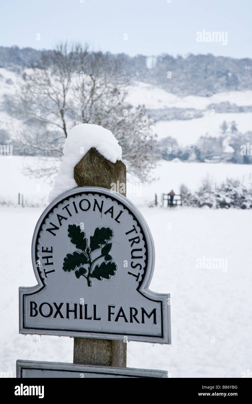 A National trust sign identifying Boxhill Farm on a snowy winter morning Stock Photo