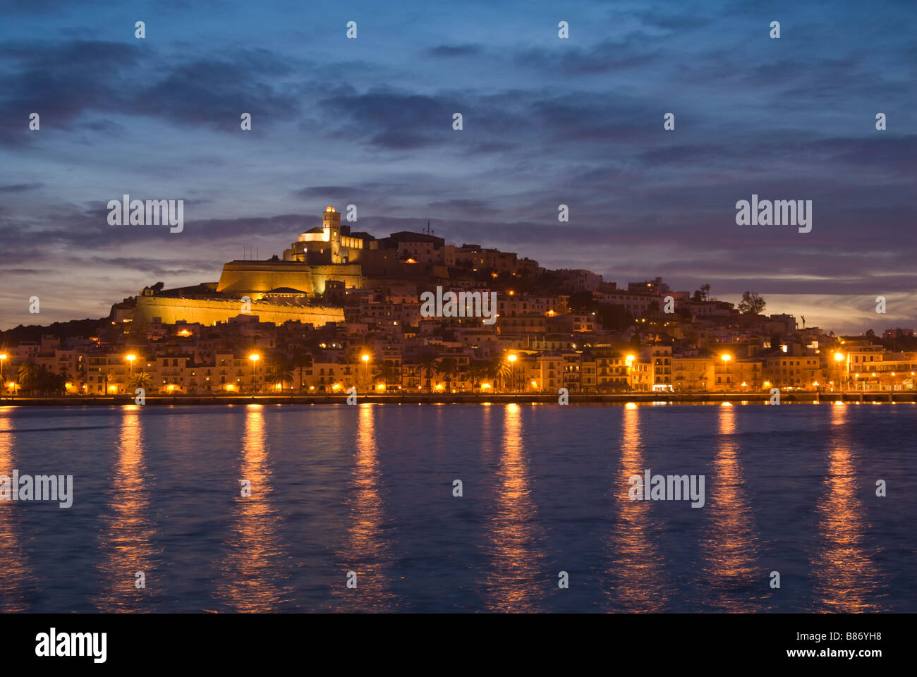 Ibiza harbour and Old Town (Dalt Vila) at dusk Stock Photo