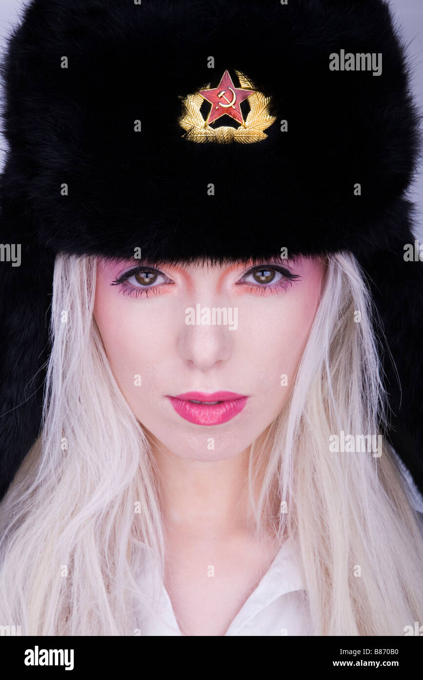 Pretty russian hat wearing girl with great hair and skin Stock Photo