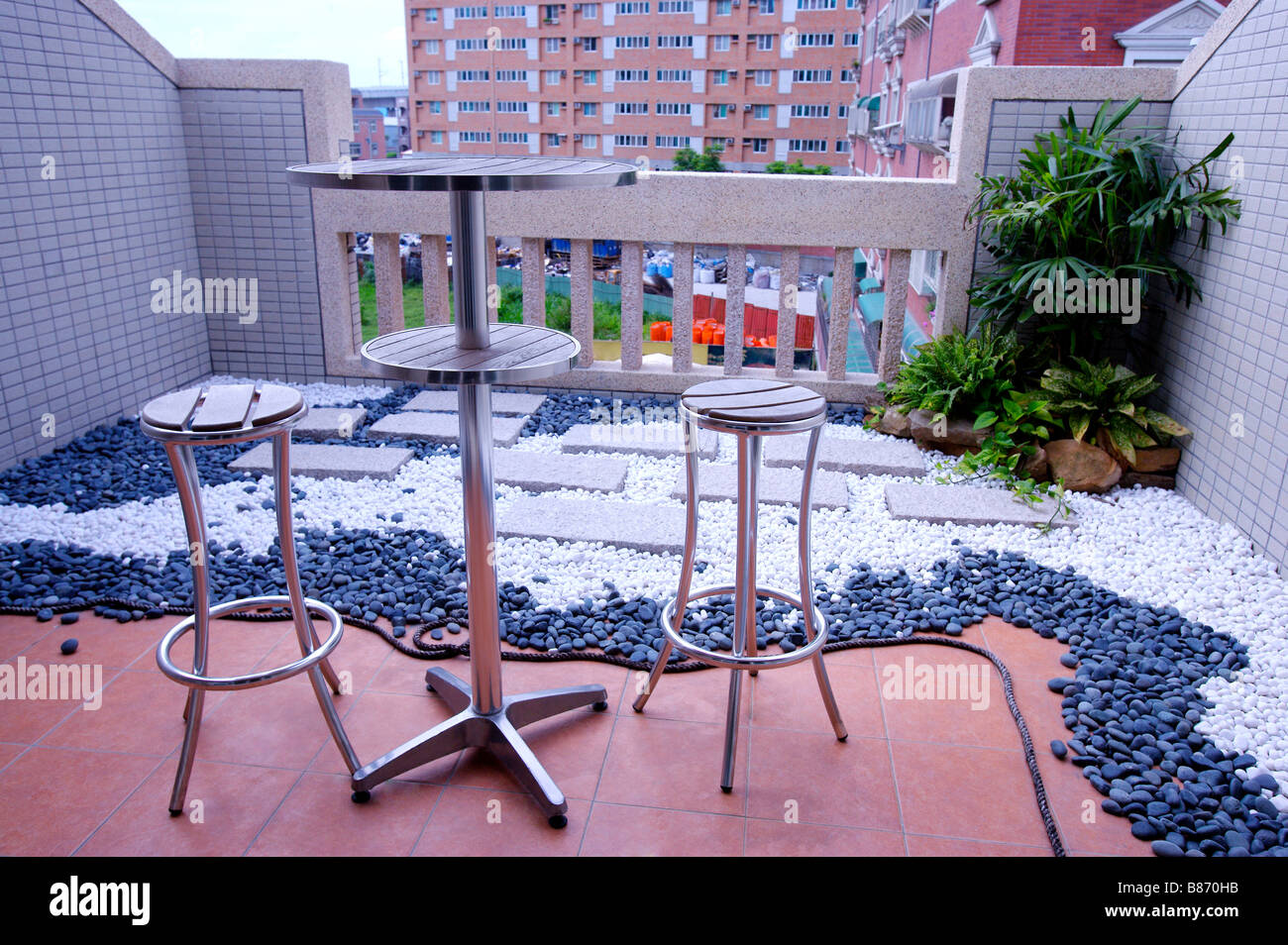 Veranda with table and chairs Stock Photo Alamy