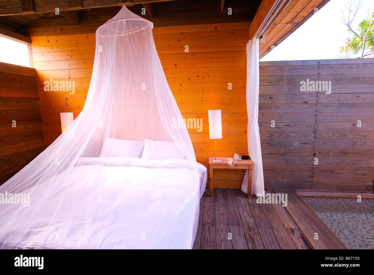 Mesh netting over bed Stock Photo Alamy
