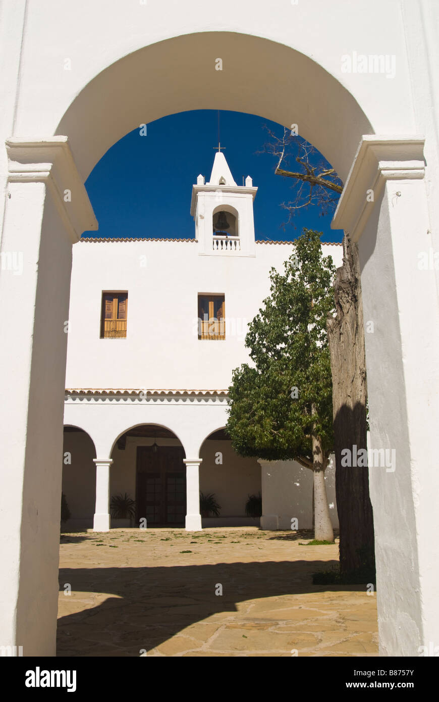 Façade and courtyard of the Church of Sant Miquel de Balansat, Ibiza, Spain Stock Photo