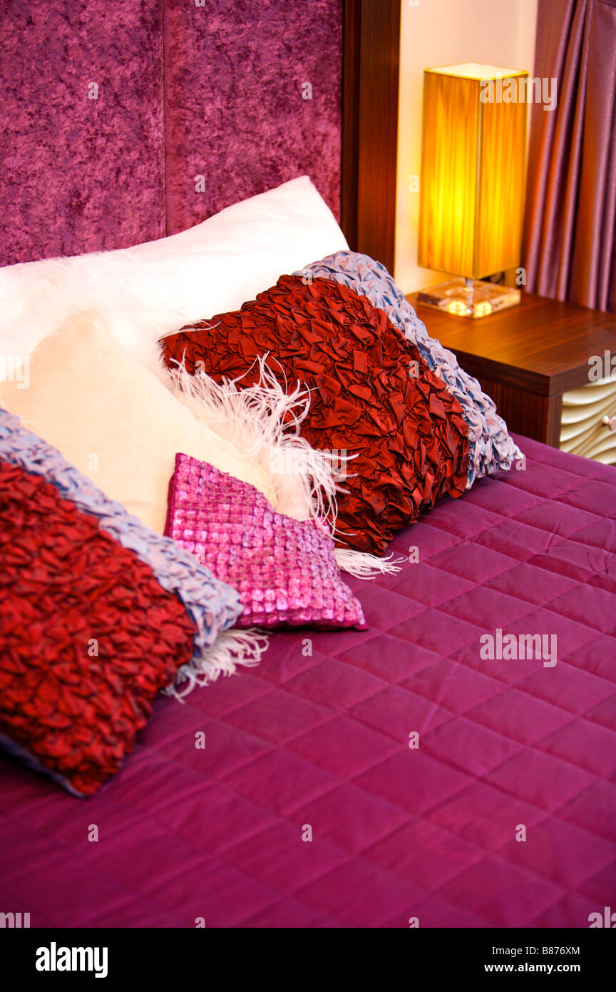 Decorative pillows on the bed Stock Photo Alamy