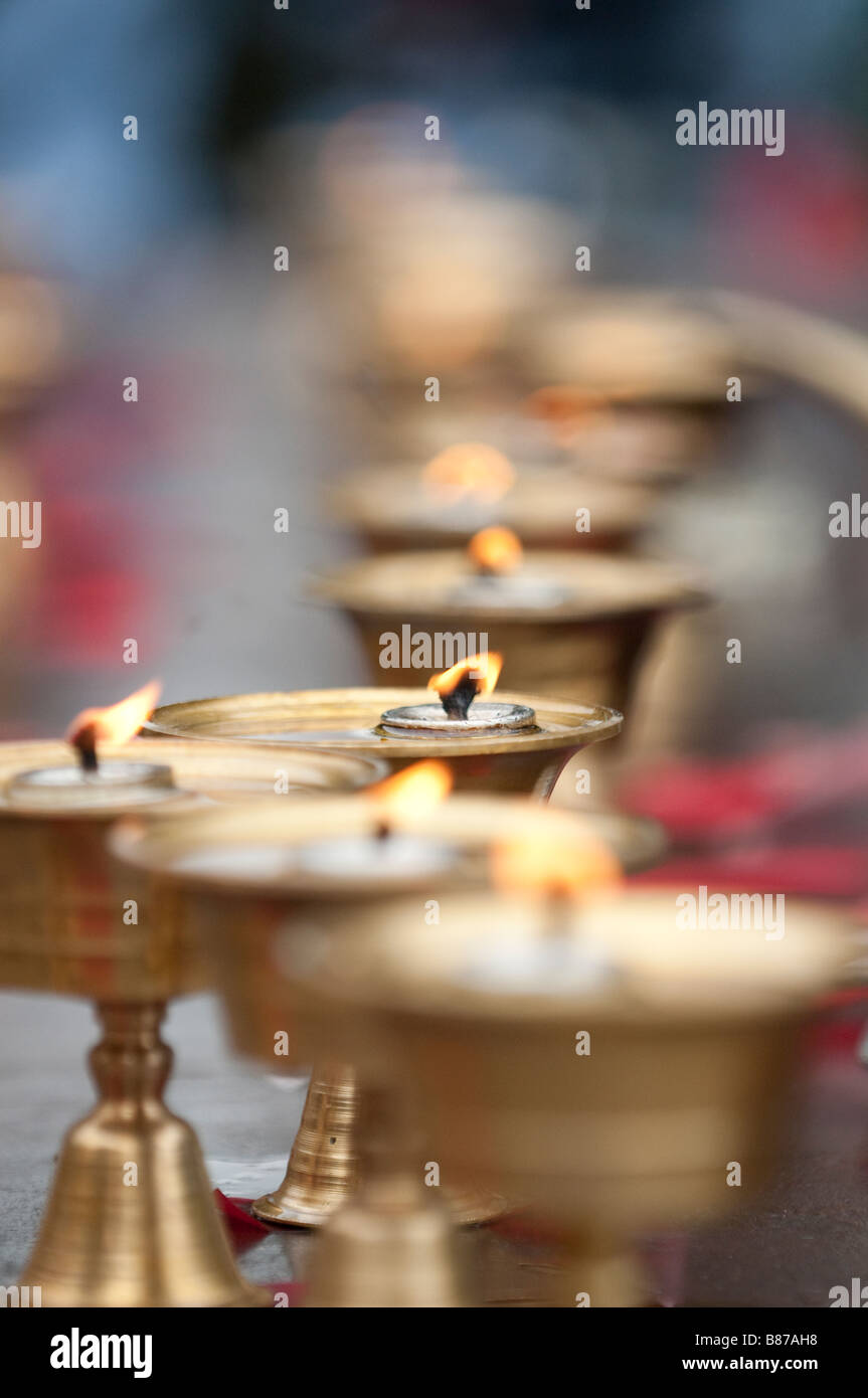 brass oillamps candles with kettle spout Stock Photo Alamy