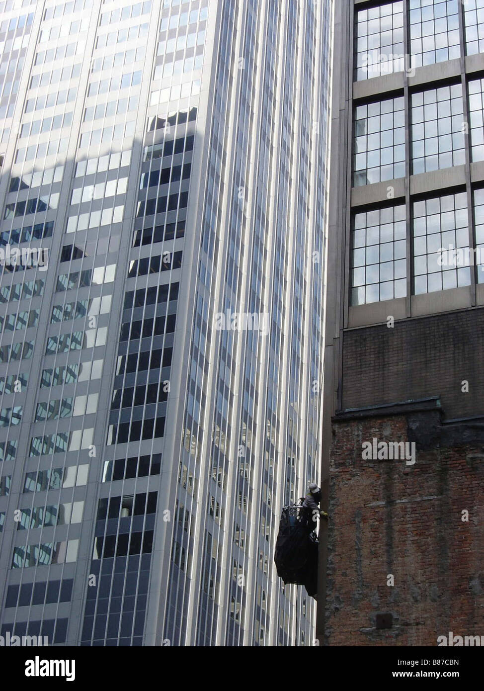 Window cleaner on a building of the 53rd street in New York Stock Photo