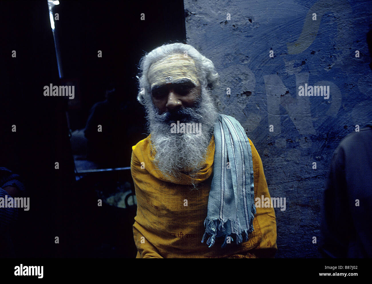 Portrait of old man in yellow shawl, Varanasi, India Stock Photo - Alamy