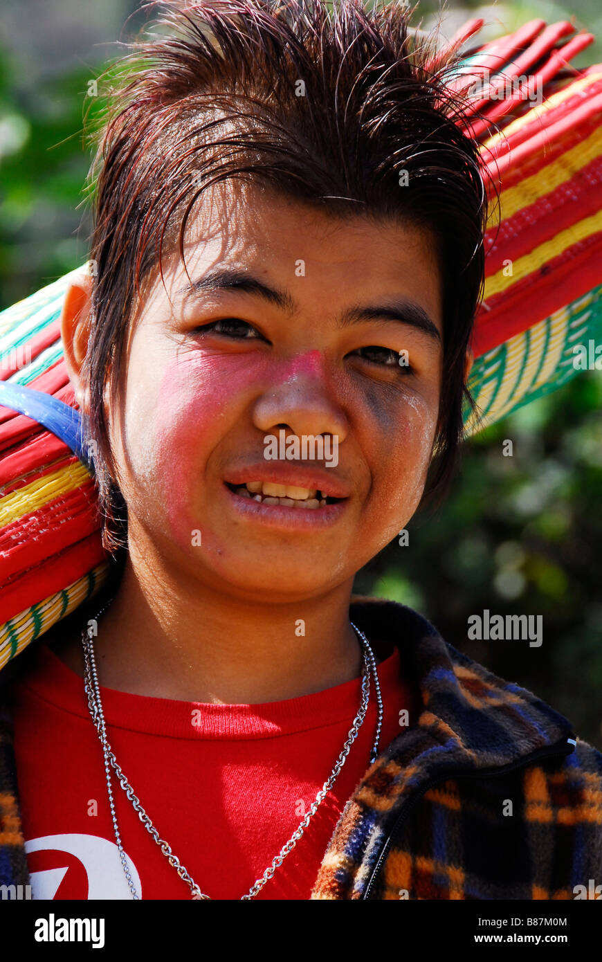 Karen boy paint his face at karen refugee funeral hires stock