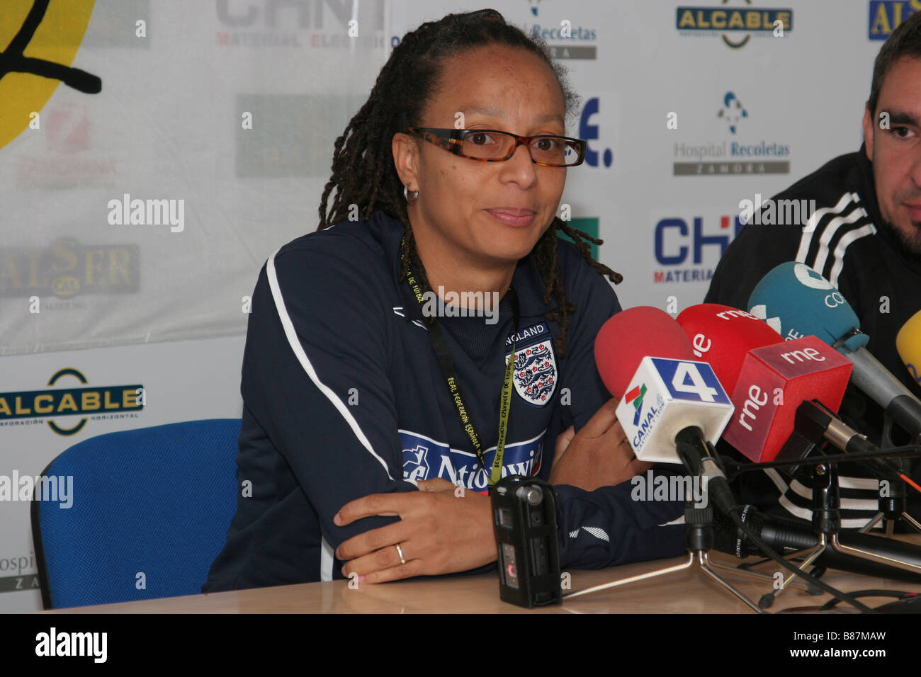 Hope Powell, OBE, manager of the England women’s football team, answers questions from the media at a press conference Stock Photo