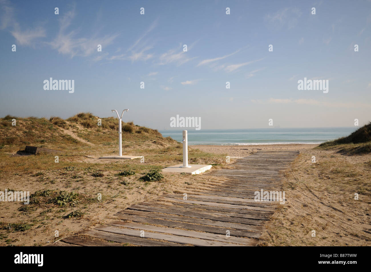 Wooden walkway to the beach and showers. El Saler. Valencian Community. Spain Stock Photo