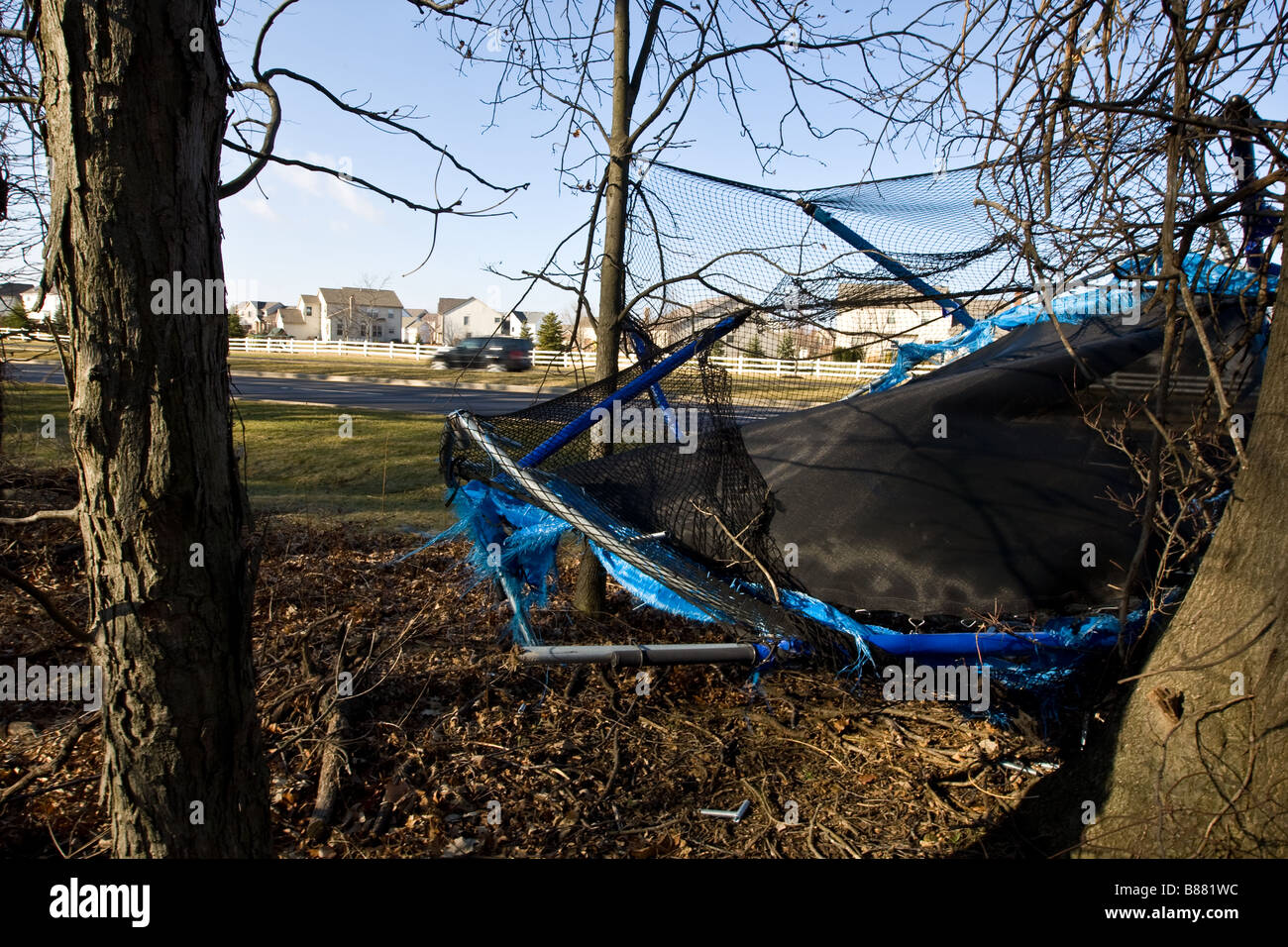 A trampoline that blew across the road in a wind storm Stock Photo Alamy