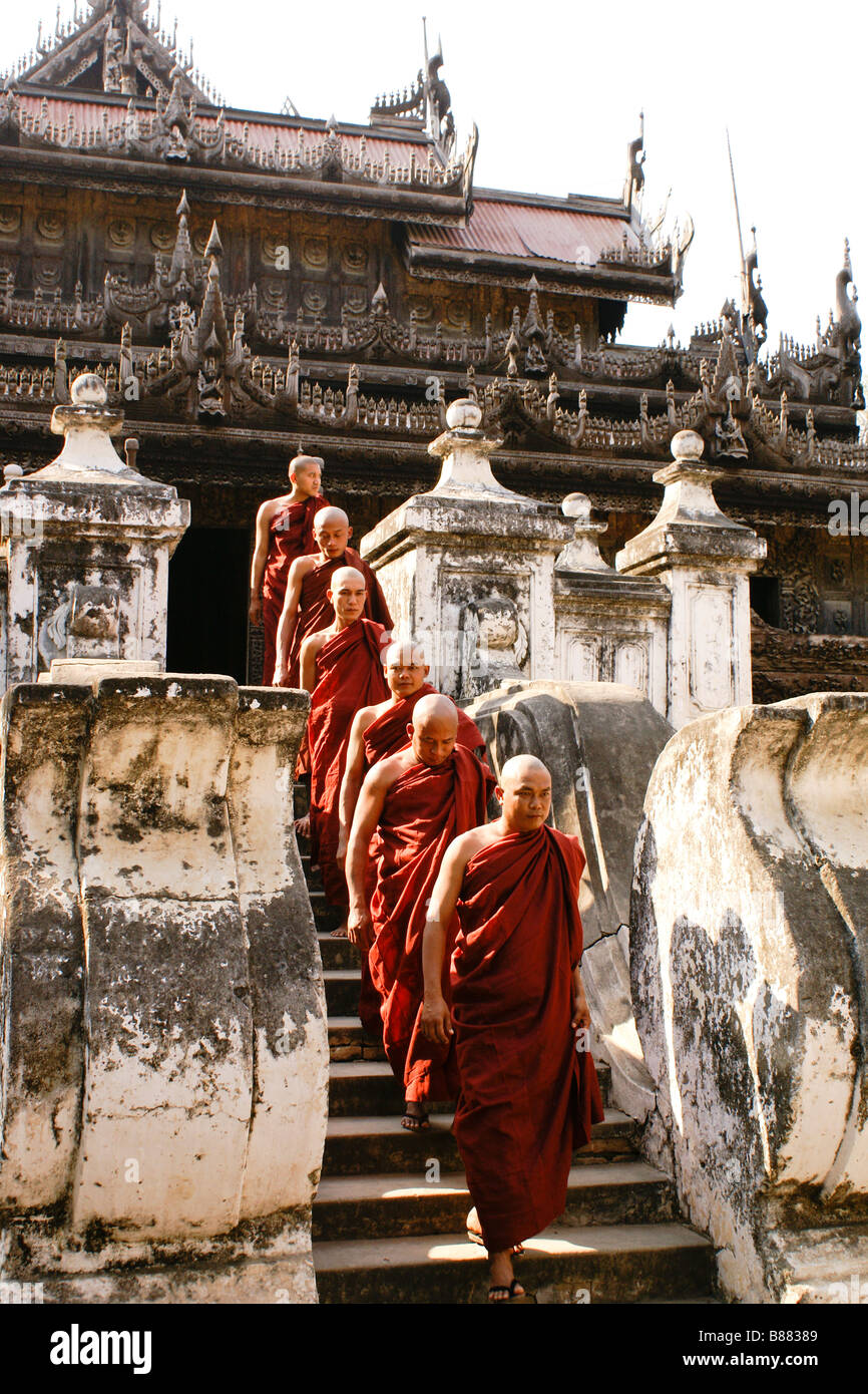 Buddhist monks at Shwenandaw teak monastery, Mandalay, Myanmar (Burma) Stock Photo