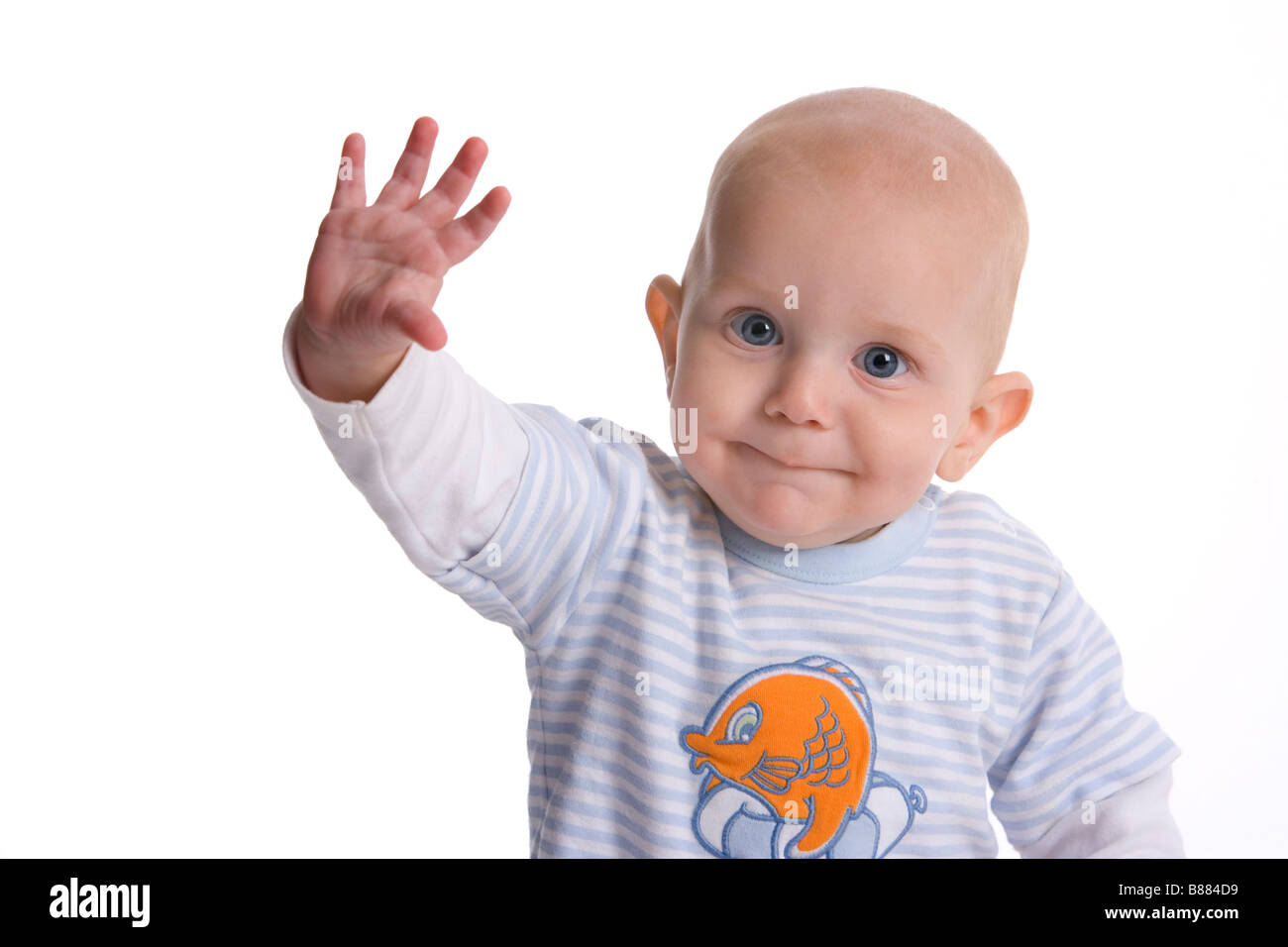 Portrait of a waving baby boy Stock Photo